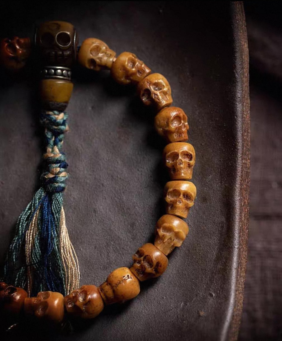 Hand-Carved Yak Bone Skull Mala Bracelet