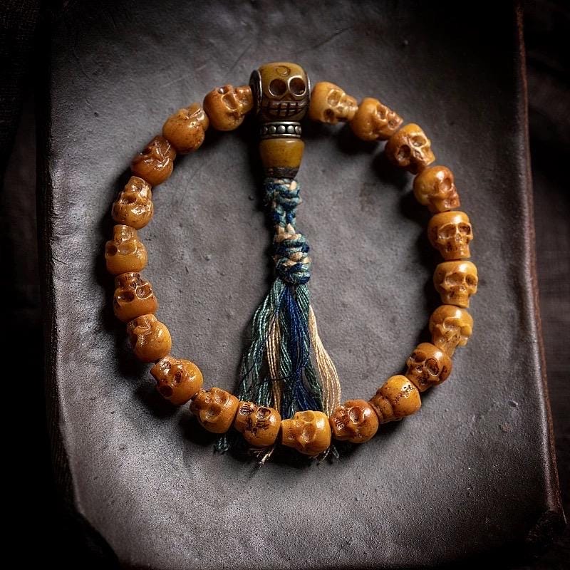Hand-Carved Yak Bone Skull Mala Bracelet